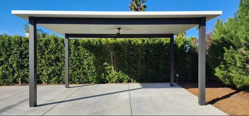 Semi-traditional freestanding 4K in espresso with white 3-inch insulated roof, one-foot overhangs, centre fan and four downlights
