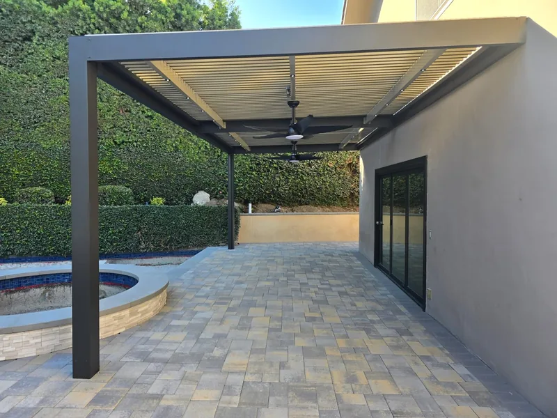 Attached espresso 4K frame built with extra span, carrying latte Solara adjustable louvers, with two ceiling fans