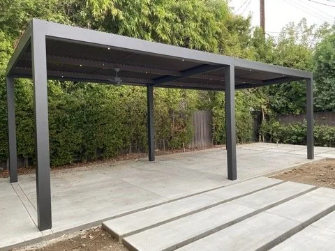 Modern freestanding 4K frame with motorized Solara adjustable louvers and 2-inch downlights, second view